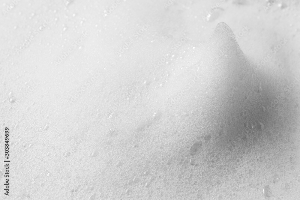 White peak from soap foam or shampoo foam with copy space White peak from soap foam or shampoo foam with copy space