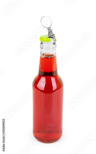 Sweet drink in a glass bottle on a white background