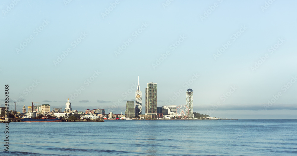 Early morning view of the the capital of Adjara - Batumi city from the opposite shore of the bay on the Black Sea in Georgia Early morning view of the the capital of Adjara - Batumi city from the opposite shore of the bay on the Black Sea in Georgia