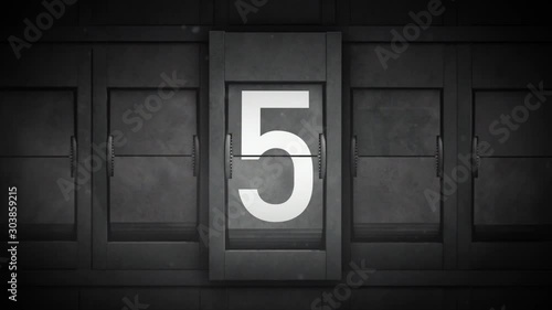 Countdown With Airport Split Flap Letters/ 4k animation of a countdown background from 9 to 0 with airport style split flap numbers showing and grain and texture overlays