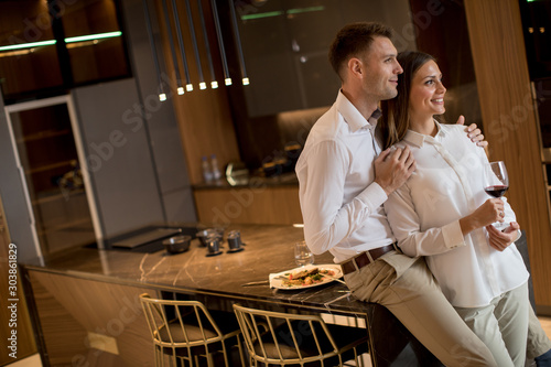 Sweet couple having drinkin...
