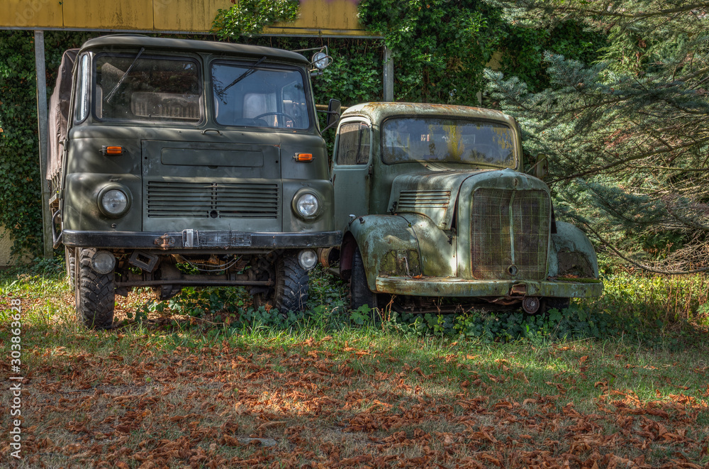 old, rusty and dilapidated trucks