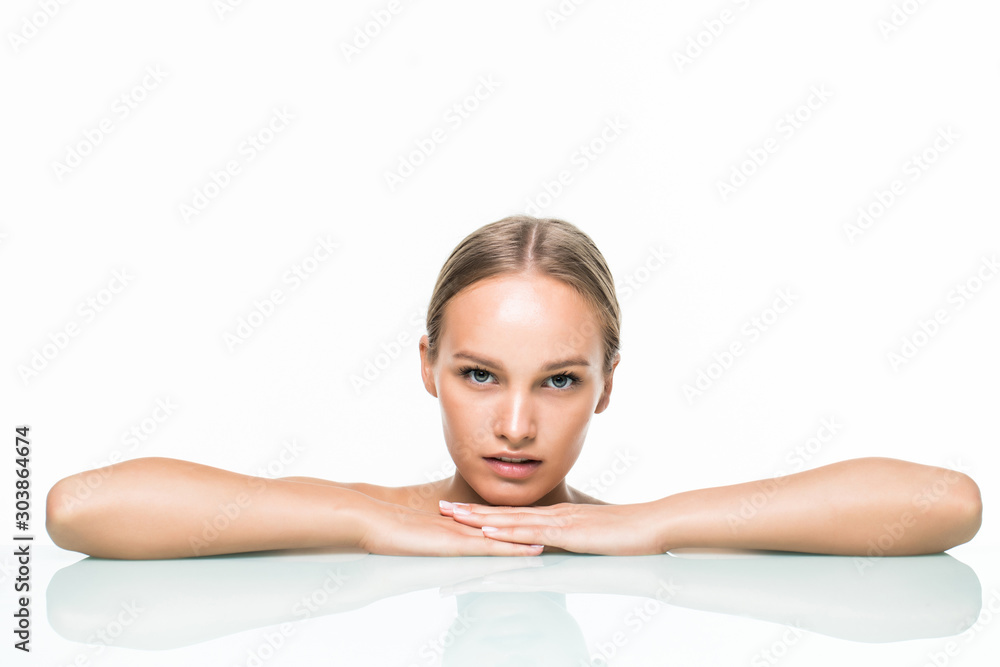 Fototapeta premium Beautiful woman face close up studio on white background