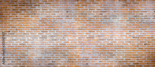 Panoramic background of wide old brick wall texture. suitable for home decoration or office design backdrop.