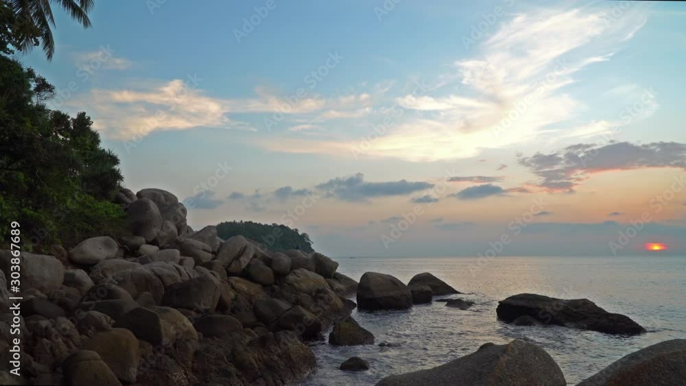 panorama sunset at Laem Sai cape. Many small and large stones surround Laem Sai cape from Karon Beach to Kata Beach.. panorama sunset at Laem Sai cape. Many small and large stones surround Laem Sai cape from Karon Beach to Kata Beach..