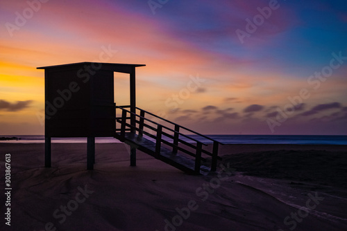 hut on beach at playa blanca, puerto del carmen, lanzarote with beautiful colours © cliff
