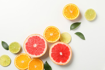 Flat lay with exotic fruits on white background, top view