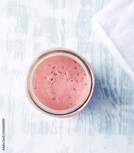 Obraz na plátně Raspberry and coconut milk smoothie (with maca powder and organic honey)