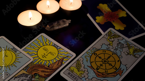 Tarot card reading. Christmas divination, ritual, rite. Magical crystal, candle. Predicting the future. Love spell. Witchcraft, magic.