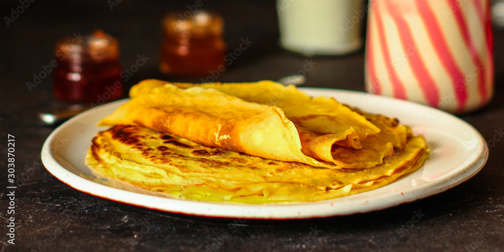 pancakes fritter crepe (delicious dessert or breakfast snack) menu concept. food background. top view. copy space pancakes fritter crepe (delicious dessert or breakfast snack) menu concept. food background. top view. copy space