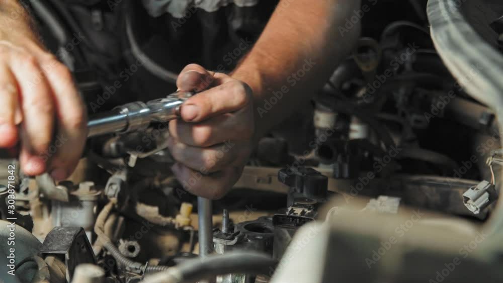 Сar engine disassembling. Service station mechanic Сar engine disassembling. Service station mechanic
