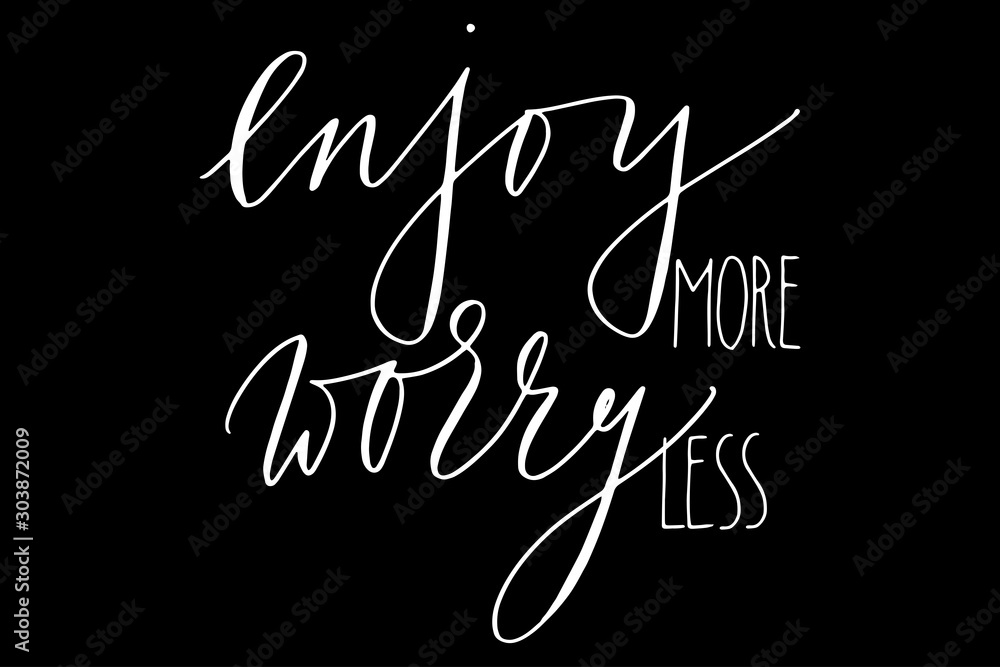 Fotografie Inspirational phrase enjoy more worry less handwritten text vector