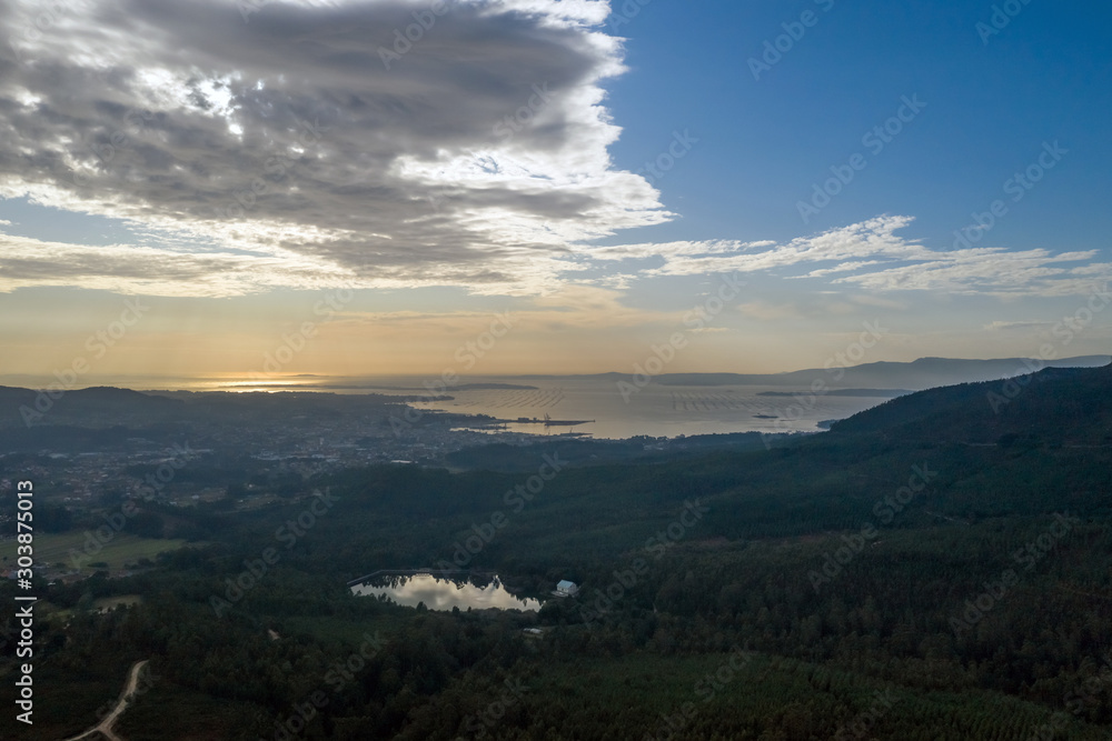 beautiful top view of the city near the ocean at sunset beautiful top view of the city near the ocean at sunset