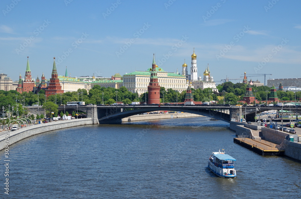 Summer view of the Moscow Kremlin, the Big Stone bridge and the Moscow-river from the Patriarchal Bridge. Moscow, Russia