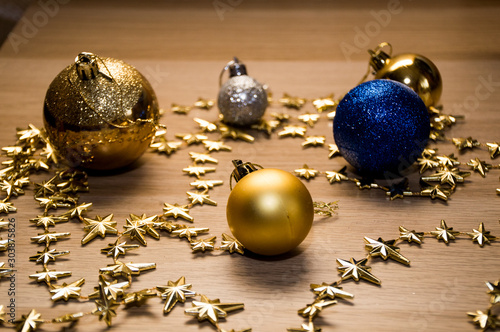 christmas still life with candle and decorations photo