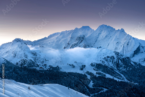 Sunrise over snow covered Alps in South Tyrol  Italy - Deep snow and blue sky