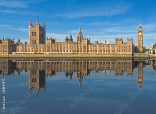 Houses of Parliament reflected in river Thames in London