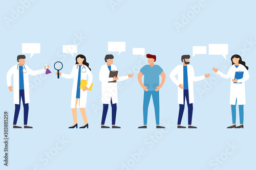 Doctors and nurses standing and talking.