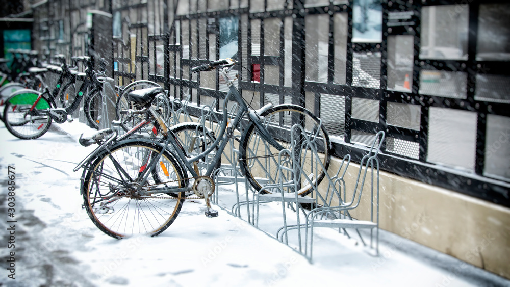 winter scene rack of bikes in snow