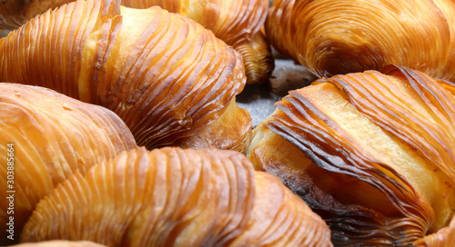 sfogliatella is a typical pastry of Italian that means thin laye photo