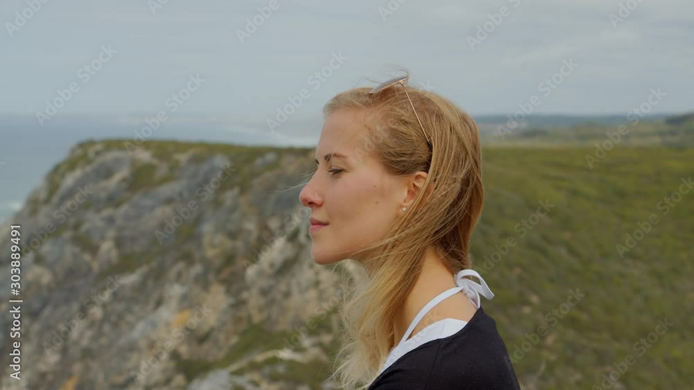 Young woman at the Natural Park of Sintra at Cabo da Roca - travel photography Young woman at the Natural Park of Sintra at Cabo da Roca - travel photography