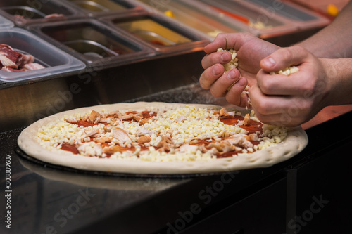 Closeup hand of chef baker ...