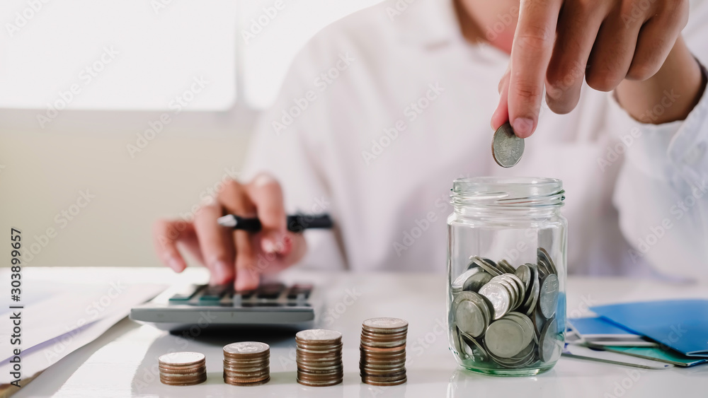 Αυτοκόλλητο asian man working with calculator to calculate numbers