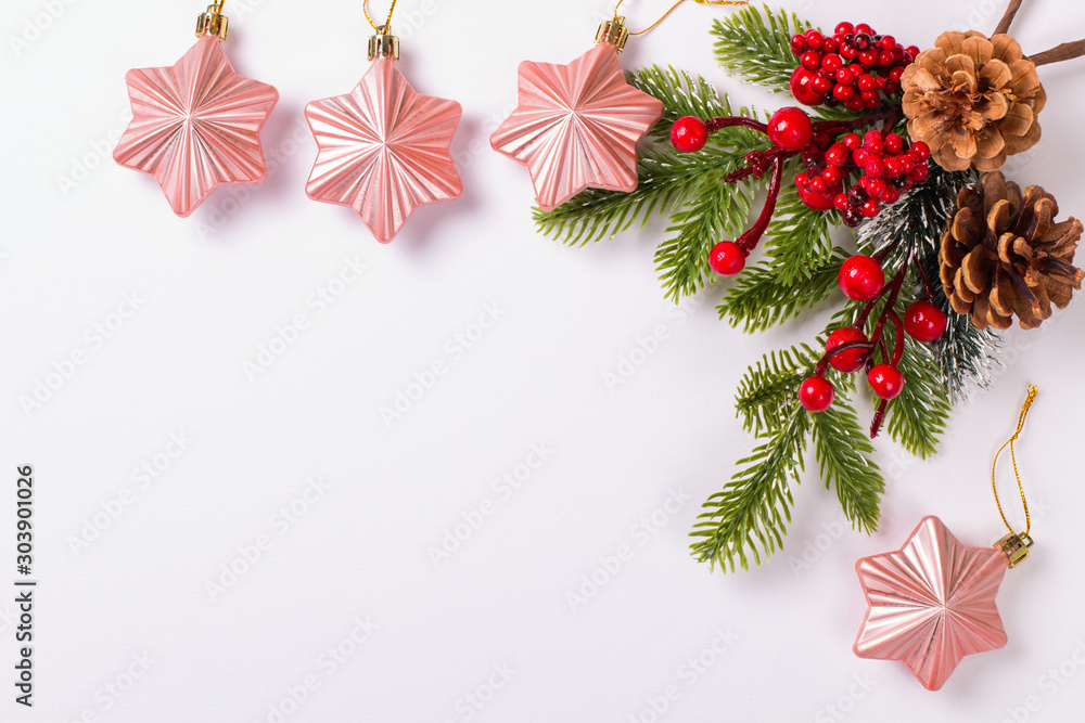 Christmas fir branch with cones on a white background, with Xmas toys. Copy space, mockup Christmas fir branch with cones on a white background, with Xmas toys. Copy space, mockup