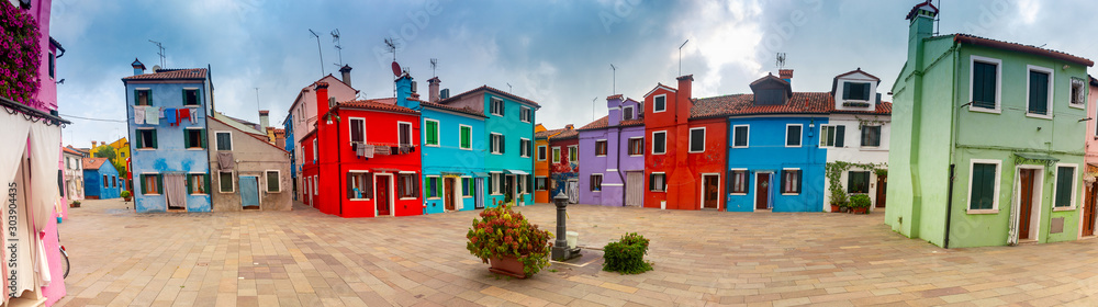 Panorama. Facades of traditional old houses on the island of Burano.