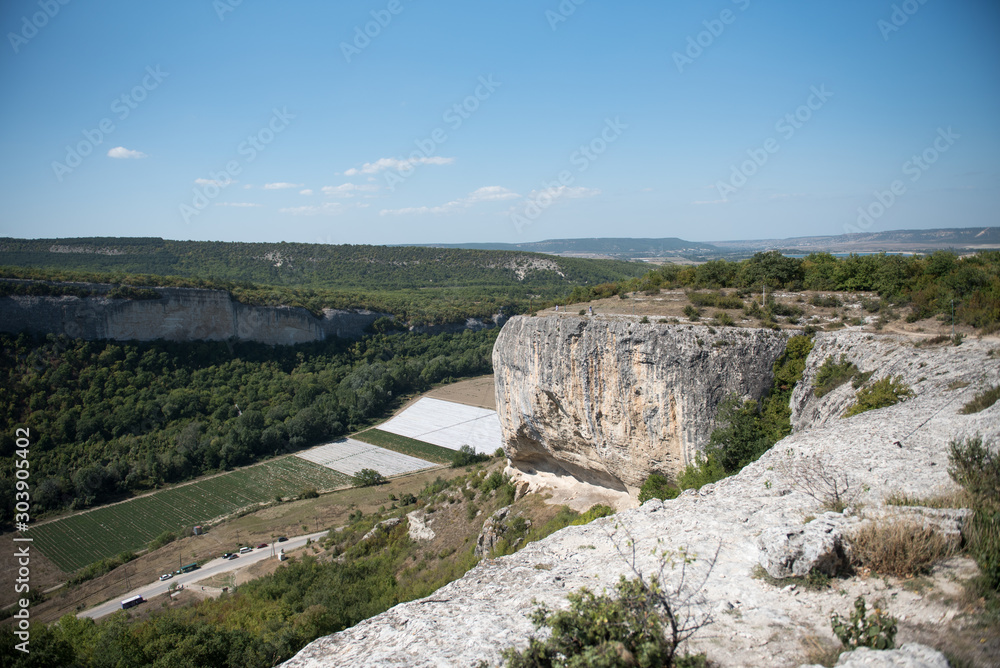 View of the plain from a high mountain. Landscape. Summer landscape. View of the plain from a high mountain. Landscape. Summer landscape.