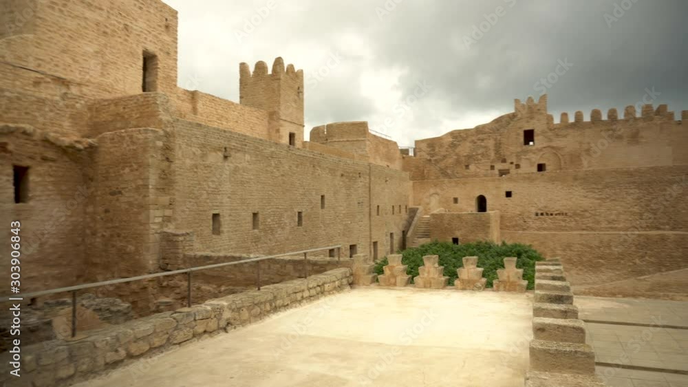 Panoramic walk through the ancient Ribat fortress in Monastir, Tunisia. Old yellow bricks. View from left to right Panoramic walk through the ancient Ribat fortress in Monastir, Tunisia. Old yellow bricks. View from left to right