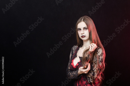 witch vampire girl in red dress