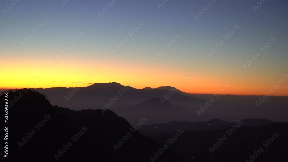 Sunrise at the view point on the Bromo volcano inside the Tengger caldera on the Java Island, Indonesia Sunrise at the view point on the Bromo volcano inside the Tengger caldera on the Java Island, Indonesia