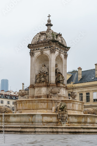 The Saint Sulpice fountain in the square in front of the famous church, Paris