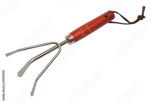 Mini hand rake ripper. Garden tool cultivator isolated on white background. Flat lay, top view