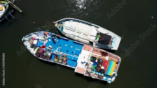View of fishing boats in a small bay in the south of the island of Sri Lanka. Aerial view. photo