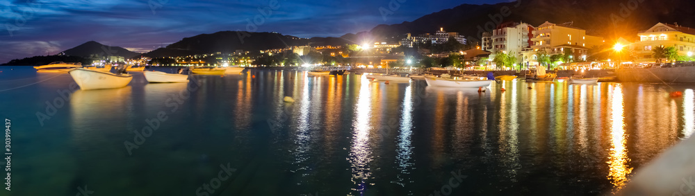 Montenegro, Rafailovici. Sunset view on sea beach Montenegro, Rafailovici. Sunset view on sea beach