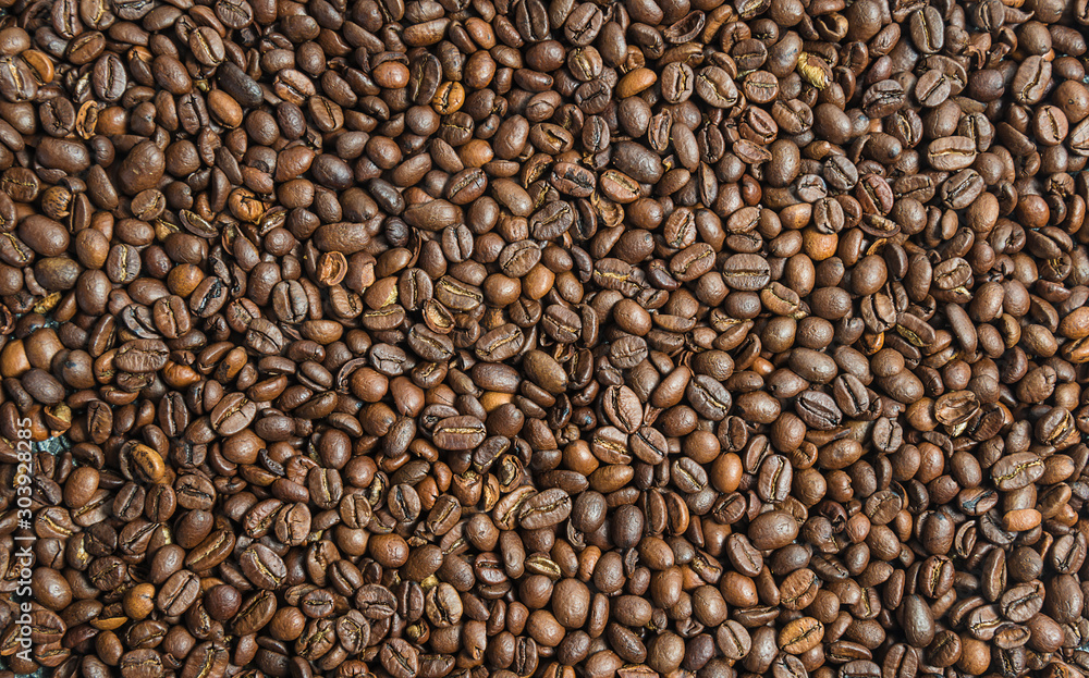 Coffee break concept. Roasted coffee beans background Coffee break concept. Roasted coffee beans background