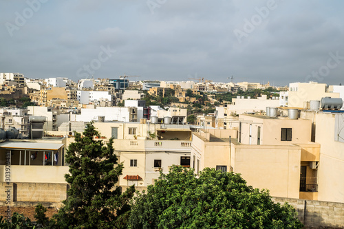 Sliema Malta, July 16 2019. Traditional Maltese architecture in Sliema Old Town in Malta, street with traditional balconies and old buildings in historical city of Malta. photo