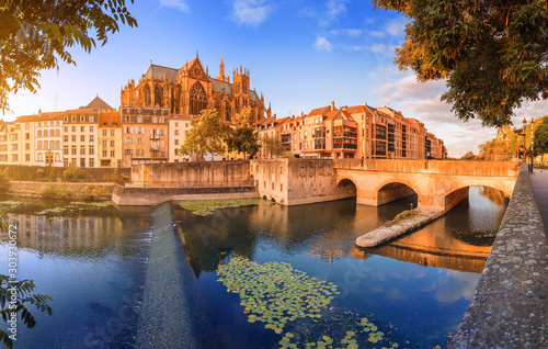 Panoramic morning view of bridge over Moselle river in Metz, France photo