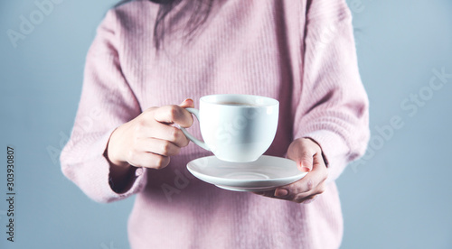 woman hand cup of tea or coffee