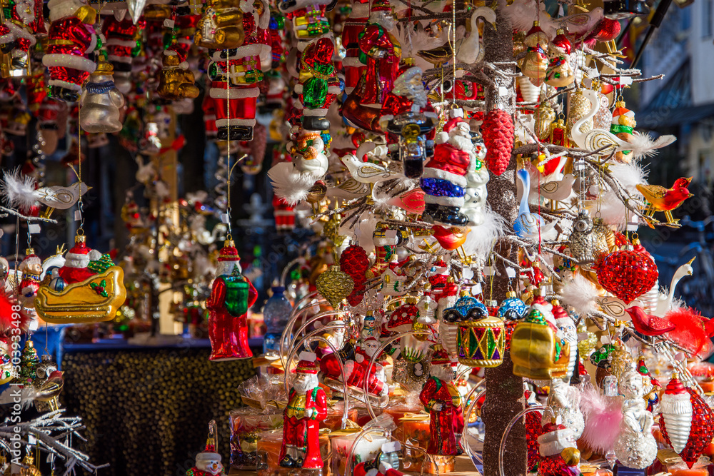 Colored decorations in a stall of the Christmas market in Merano. Trentino Alto Adige