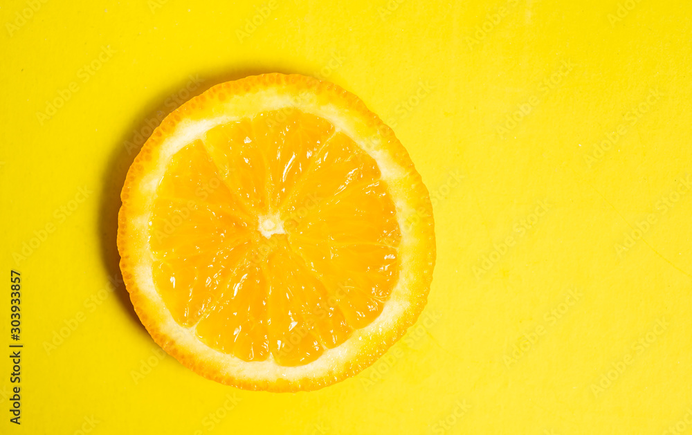 Orange slice on a matching background Orange slice on a matching background