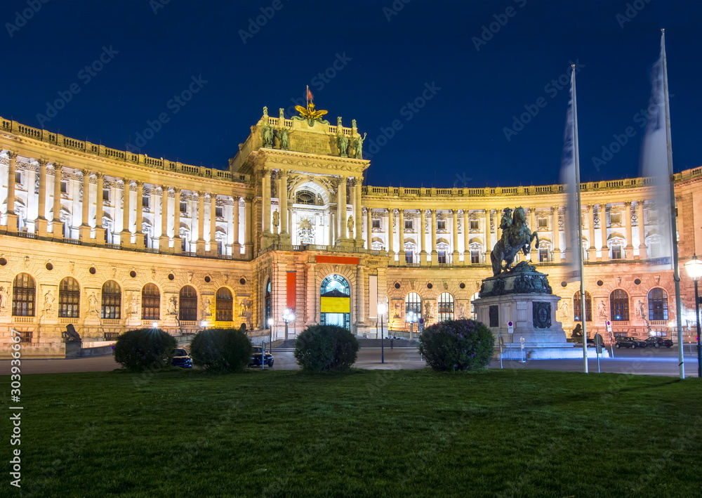Hofburg palace and statue of Prince Eugene at night, Vienna, Austria