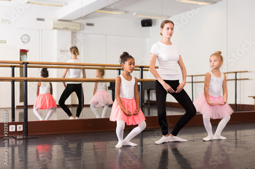 Ballet teacher and two little girls