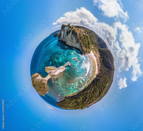 tiny planet of beach with cliffs 