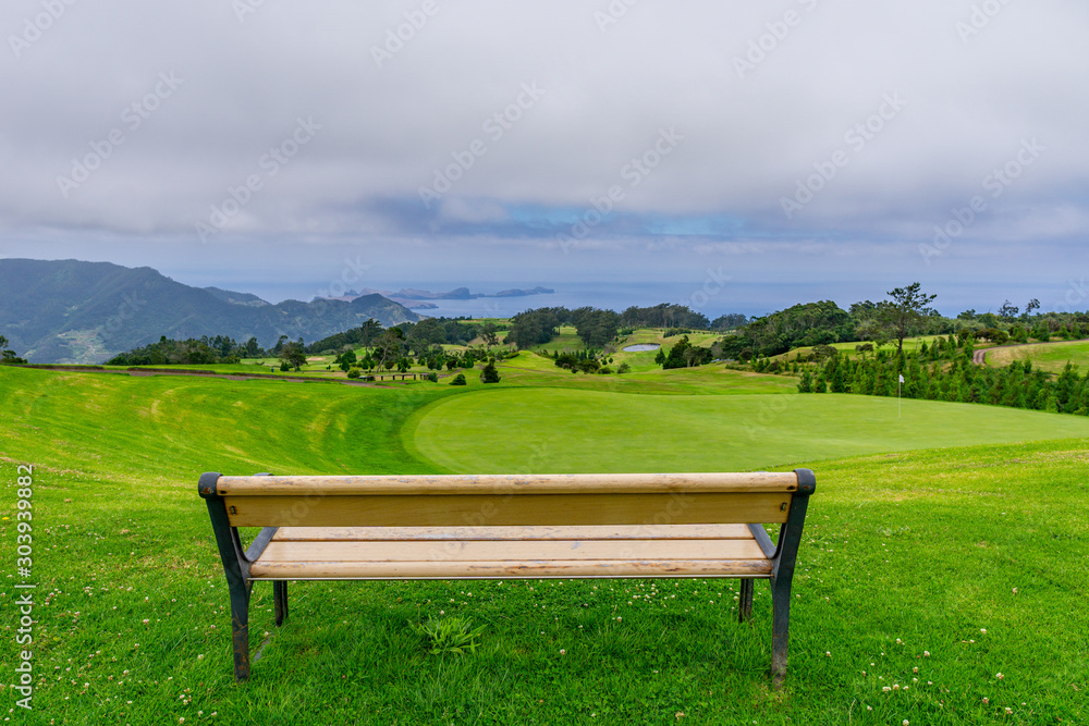 Park bench outdoor landscape. Wooden bench in golf course landscape. Mountain park bench panorama. Park bench relax Park bench outdoor landscape. Wooden bench in golf course landscape. Mountain park bench panorama. Park bench relax