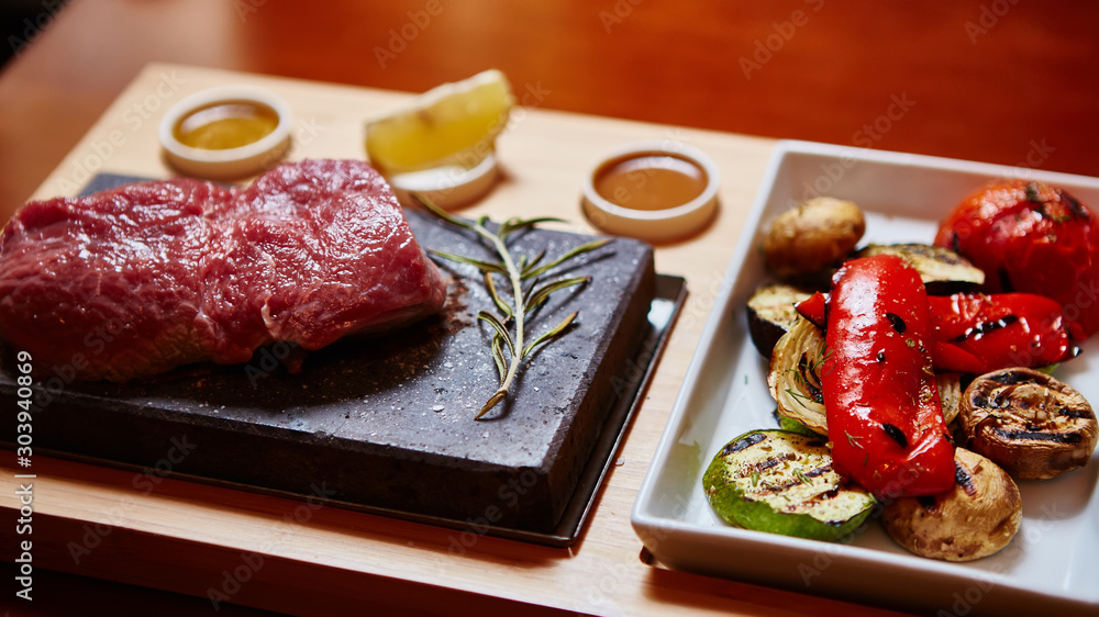 meat grilled on astone with vegetables meat grilled on astone with vegetables