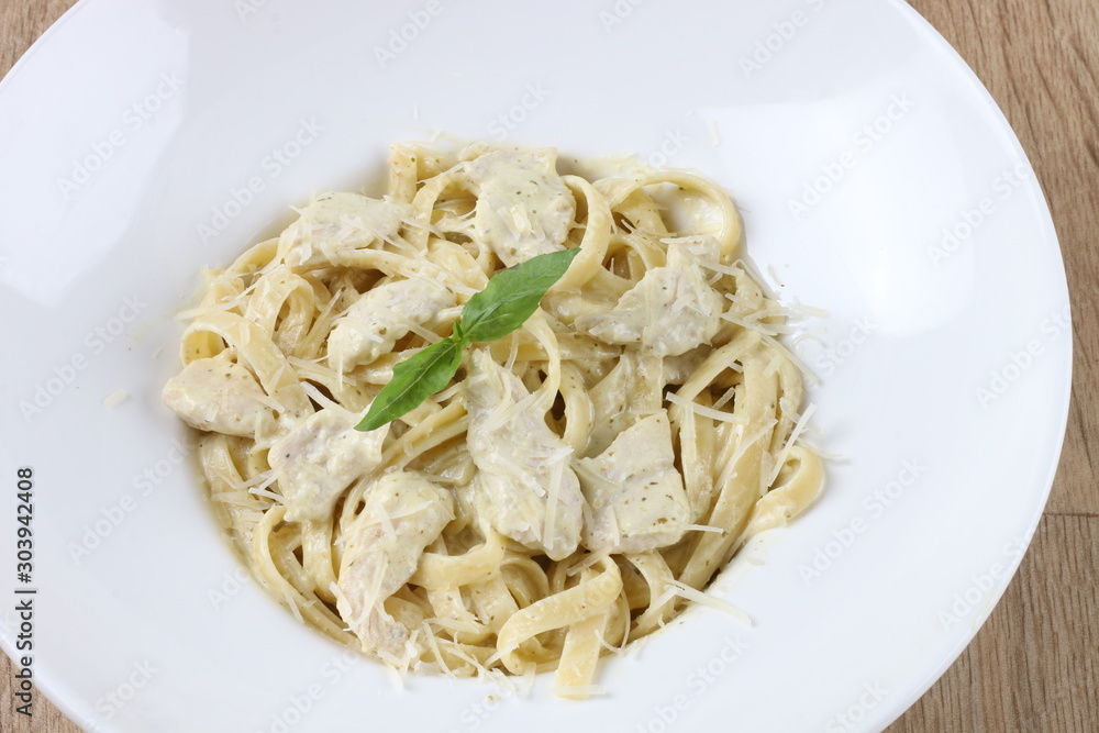 Pasta is a type of Italian food typically made from an unleavened dough of durum wheat flour mixed with water or eggs, and formed into sheets or various shapes, then cooked by boiling or baking