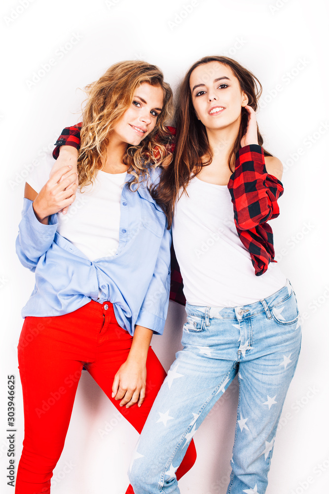 best friends teenage girls together having fun, posing emotional on white background, besties happy smiling, lifestyle people concept closeup best friends teenage girls together having fun, posing emotional on white background, besties happy smiling, lifestyle people concept closeup